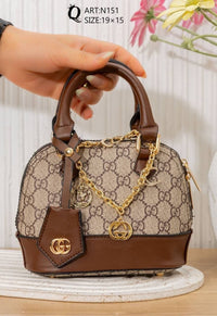 N151 — Brown mini patterned handbag front, 19 × 15 (Brown)