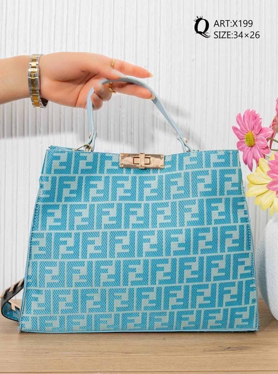 X199 — Turquoise patterned top-handle tote front, 34 × 26 (Turquoise)