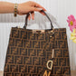 X199 — Brown patterned top-handle tote front, 34 × 26 (Brown)